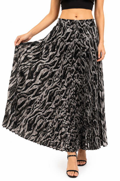Model wearing a black and grey animal print pleated maxi skirt with elasticated waistband