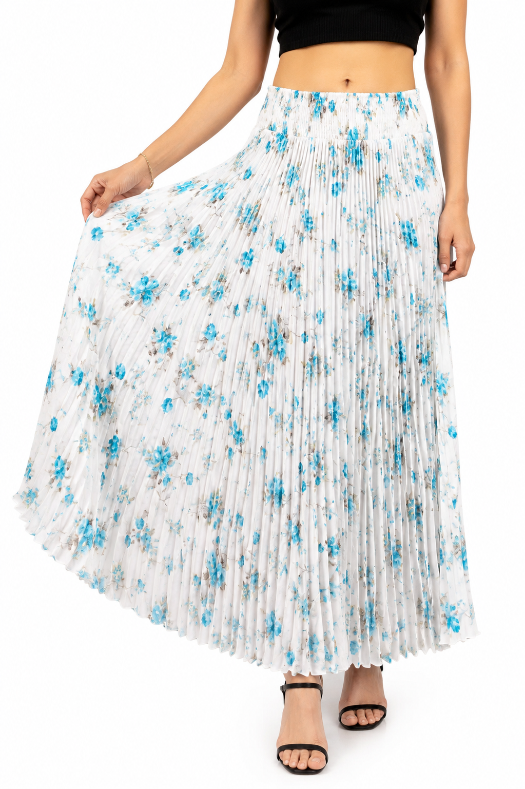 Model wearing a teal and black animal print pleated maxi skirt with elasticated waistband